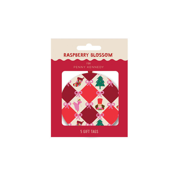 Christmas gift tag with red and white check pattern with pink bows, stocking, Christmas trees and nutcracker designs. In packaging saying &
