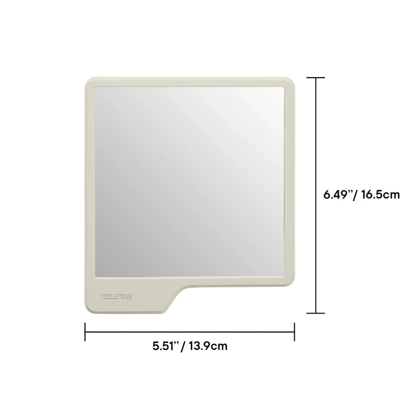 Sand coloured shower mirror with dimensions, on a white background