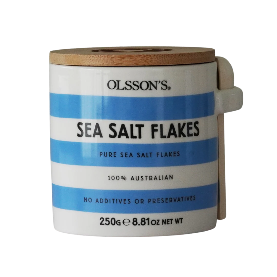 A stoneware jar with blue and white stripes of Olssons sea salt flakes