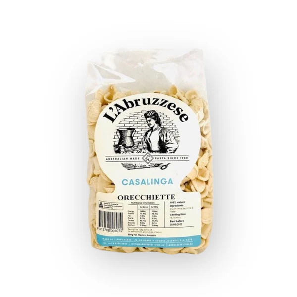 A bag of L'Abruzzese Orecchieette pasta on a white background