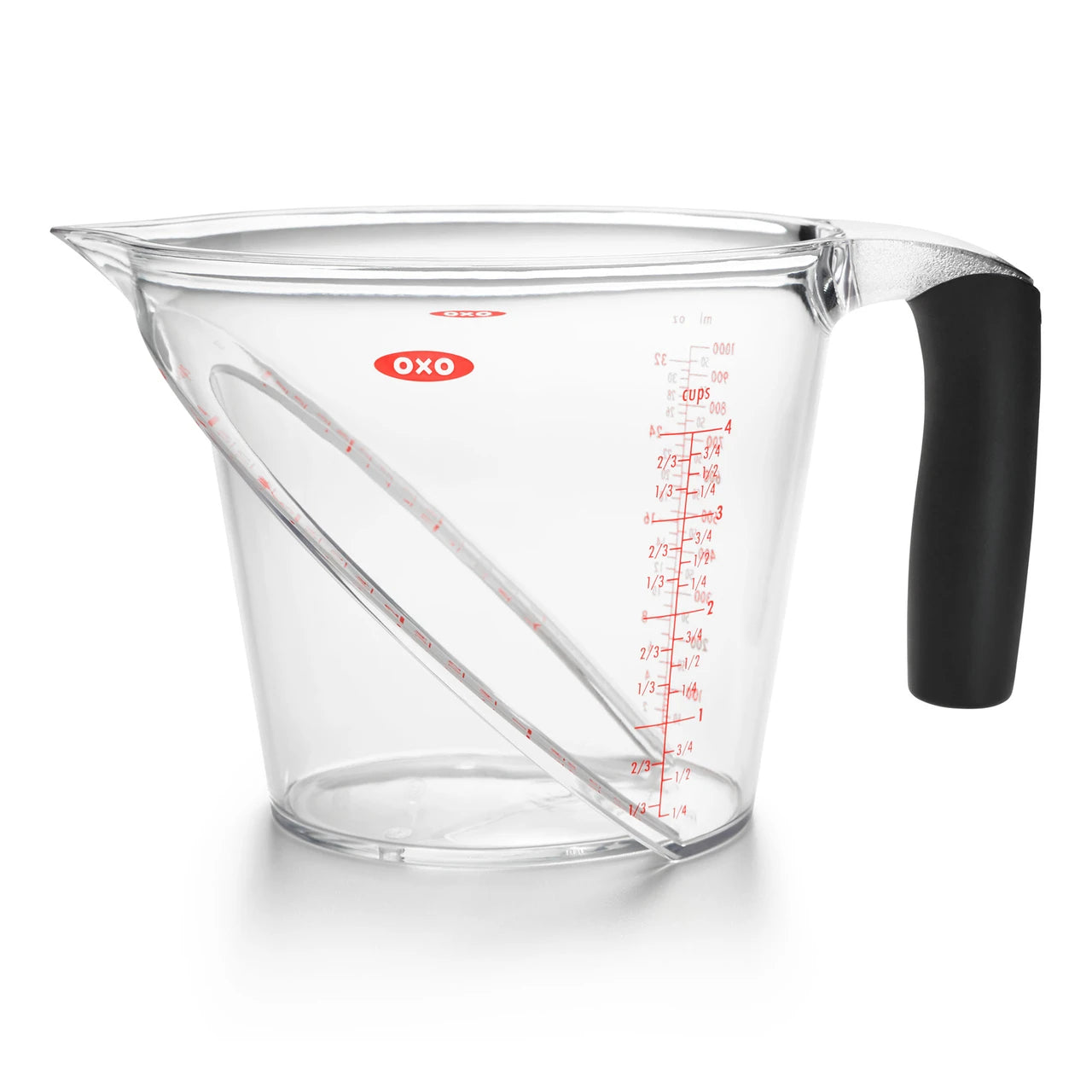Clear measuring cup with black handle and red measurement markings on a white background