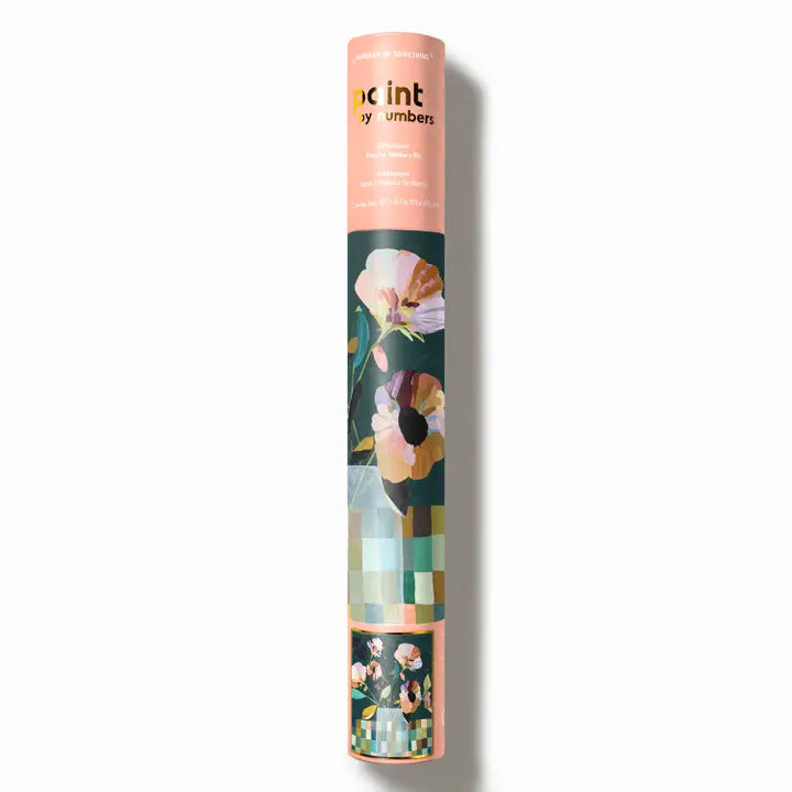 Paint by numbers kit in cylinder with floral design and text on a white background.