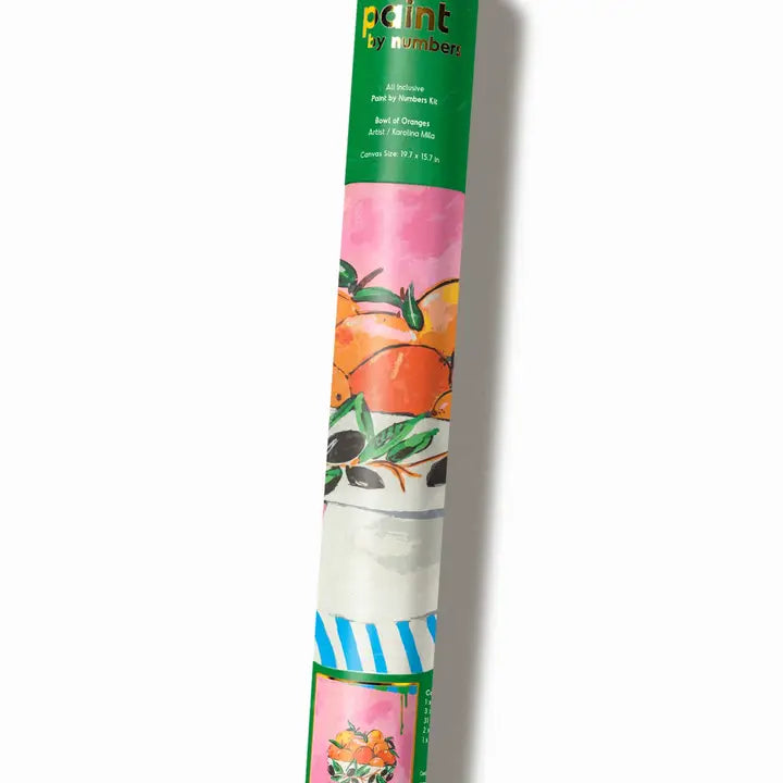 A rolled-up paint by numbers, wrapped in a colorful sleeve with fruit illustrations and a green title band, photographed on a white background.