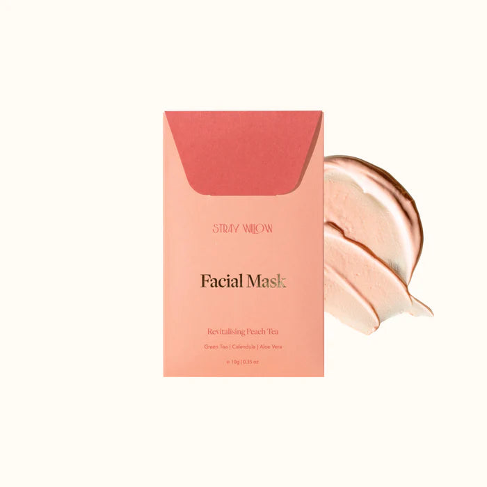 Pink packaging of Stray Willow peach tea facial mask on a white background