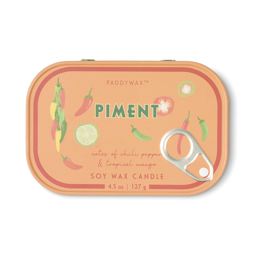 Paddywax Piment candle packaging with chili peppers and lime on a white background