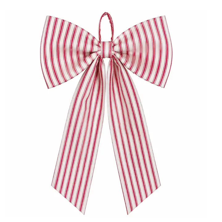 A large fabric bow with long tails, featuring a vertical red and white stripe pattern, isolated on a white background.