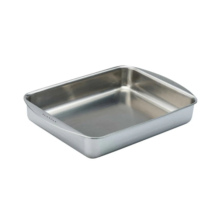 Stainless steel baking tray on a white background