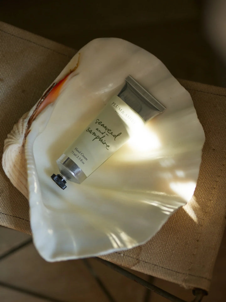 Hand cream in a shell with &