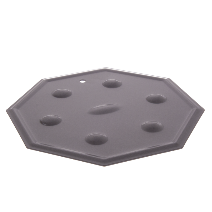 Hexagonal simmering mat on a white background