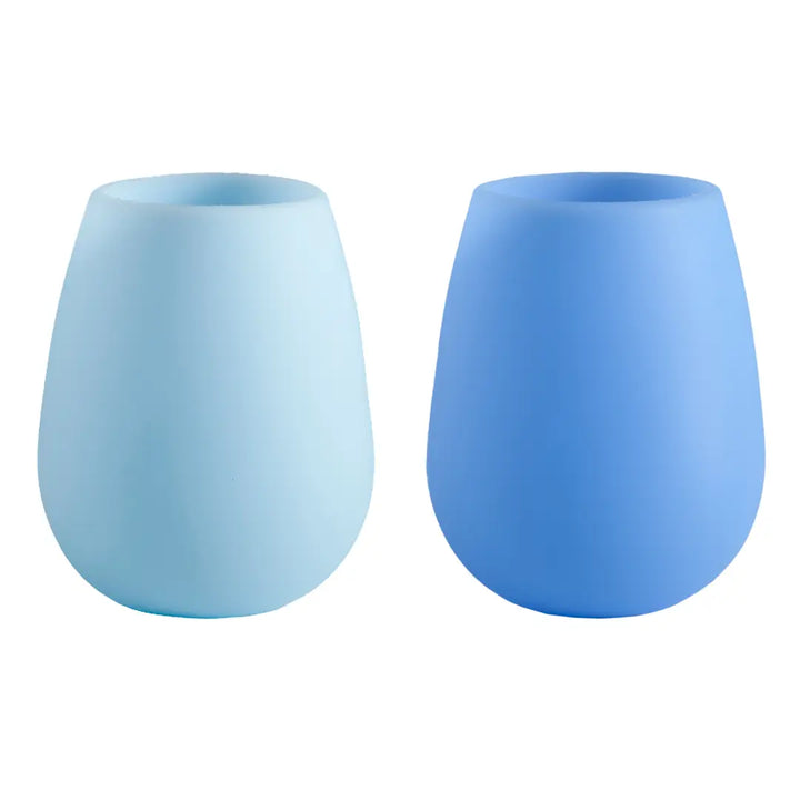 Two blue silicone tumblers on a white background