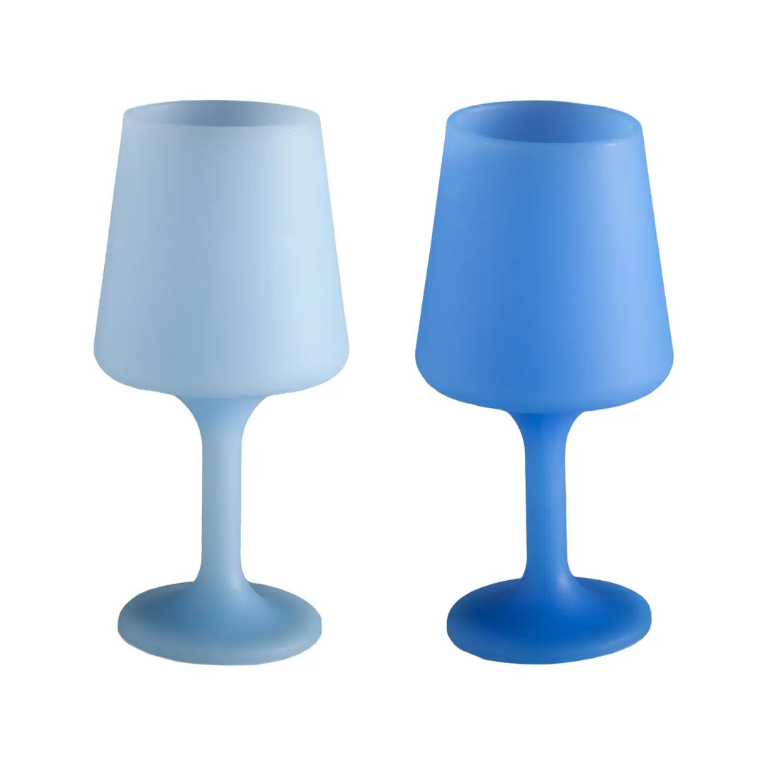Two blue silicone unbreakable wine glasses on a white background