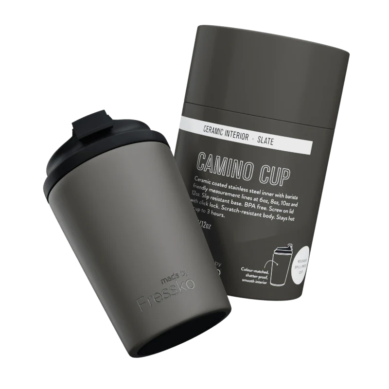Grey thermos cup with packaging on a white background