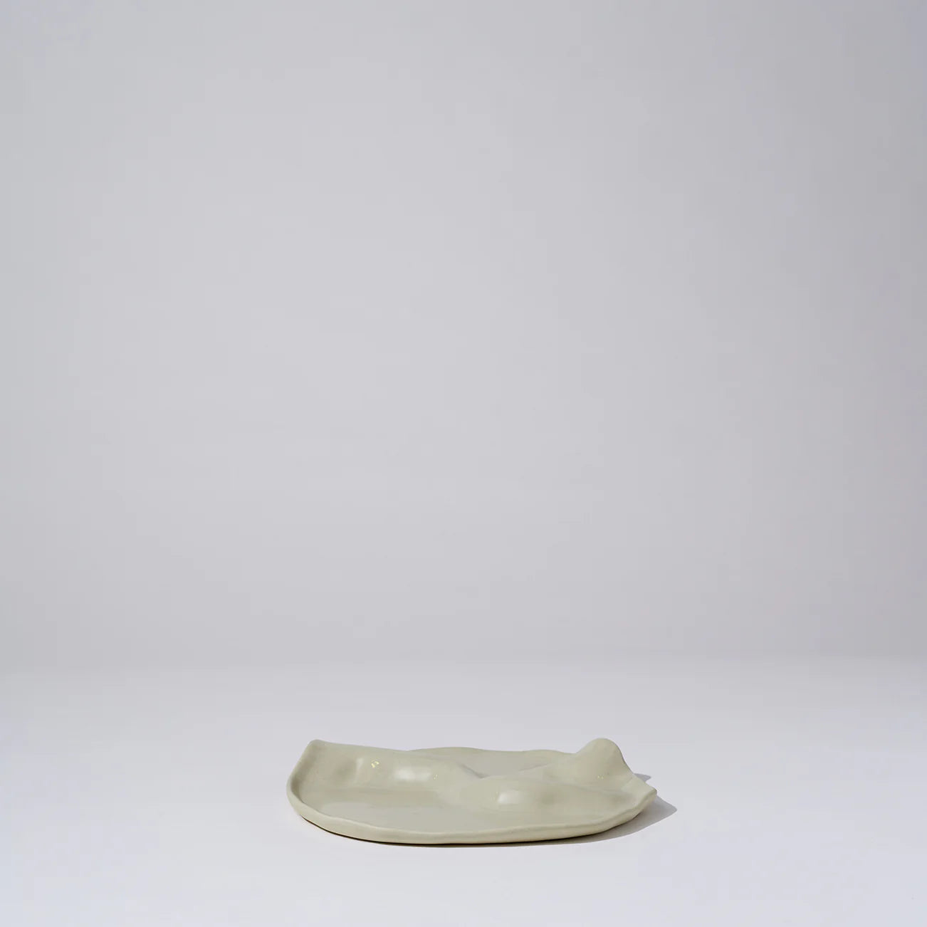White ceramic dish on a light gray background