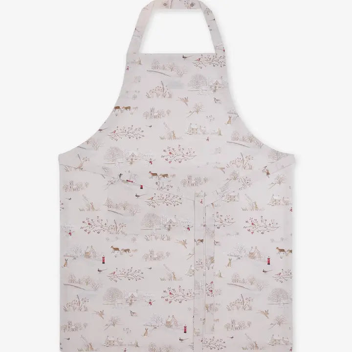 Fabric apron with a wintery Christmas print on a white background