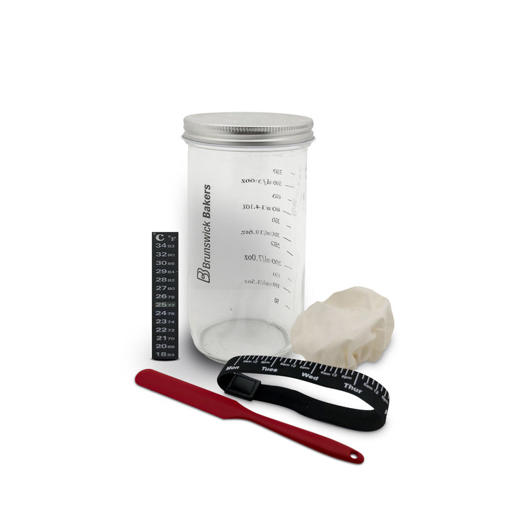 Sourdough starter kit accessories on a white background