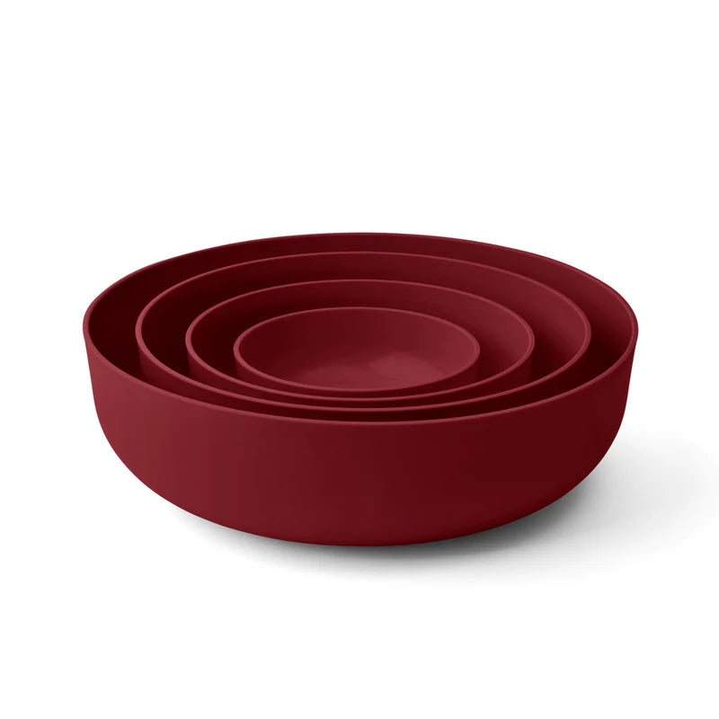 Three nested round bowls in a deep burgundy red color, shown on a clean white background.