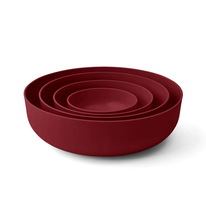 Three nested round bowls in a deep burgundy red color, shown on a clean white background.