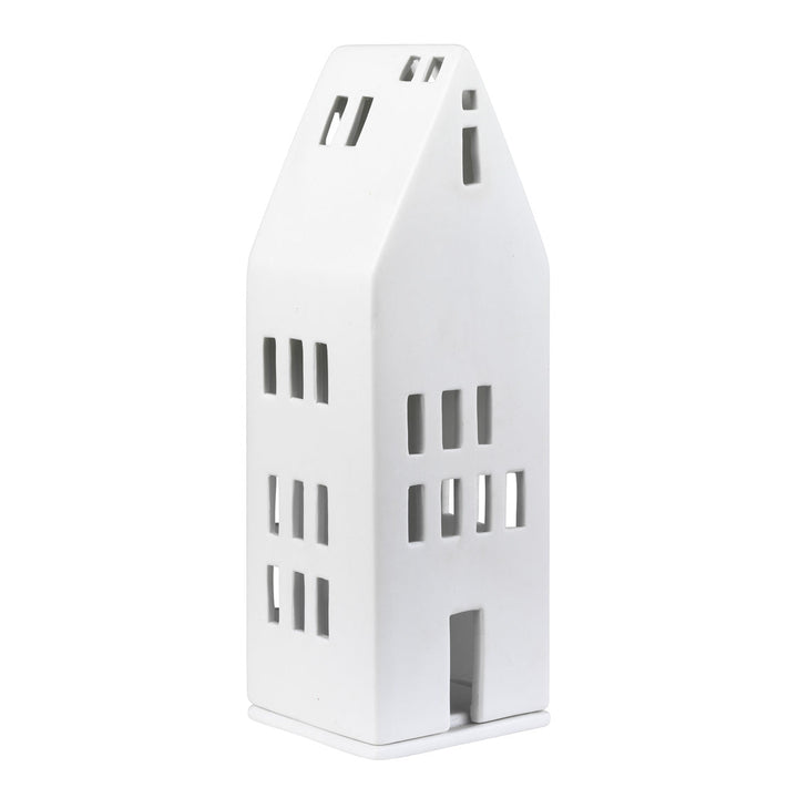 White porcelain tealight house candle holder on white background