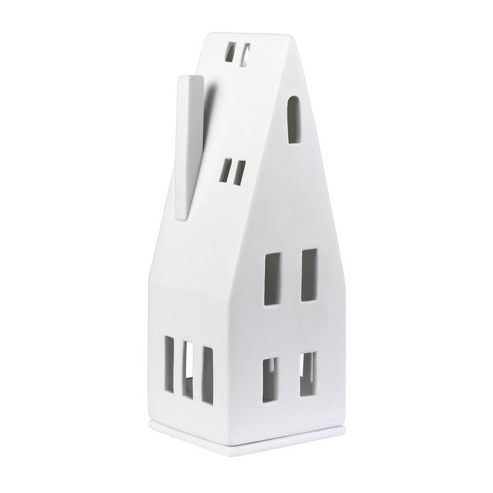 White porcelain tealight house candle holder on white background