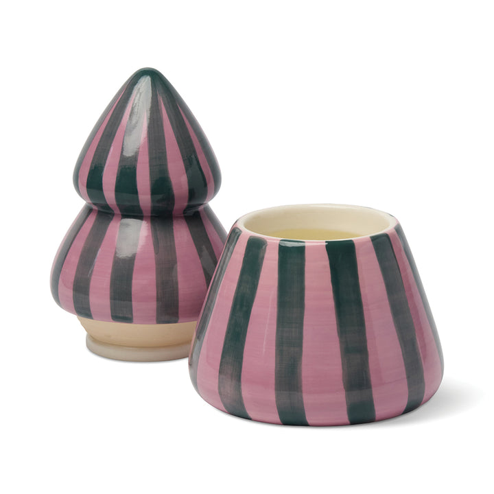 Pink and green striped Christmas tree candle on a white background
