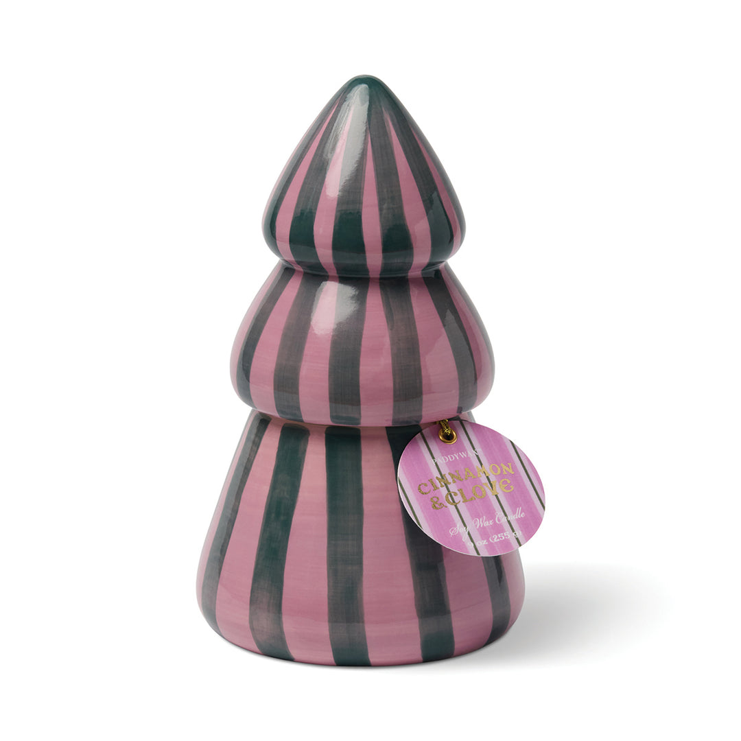 Striped pink and green Christmas tree candle on a white background