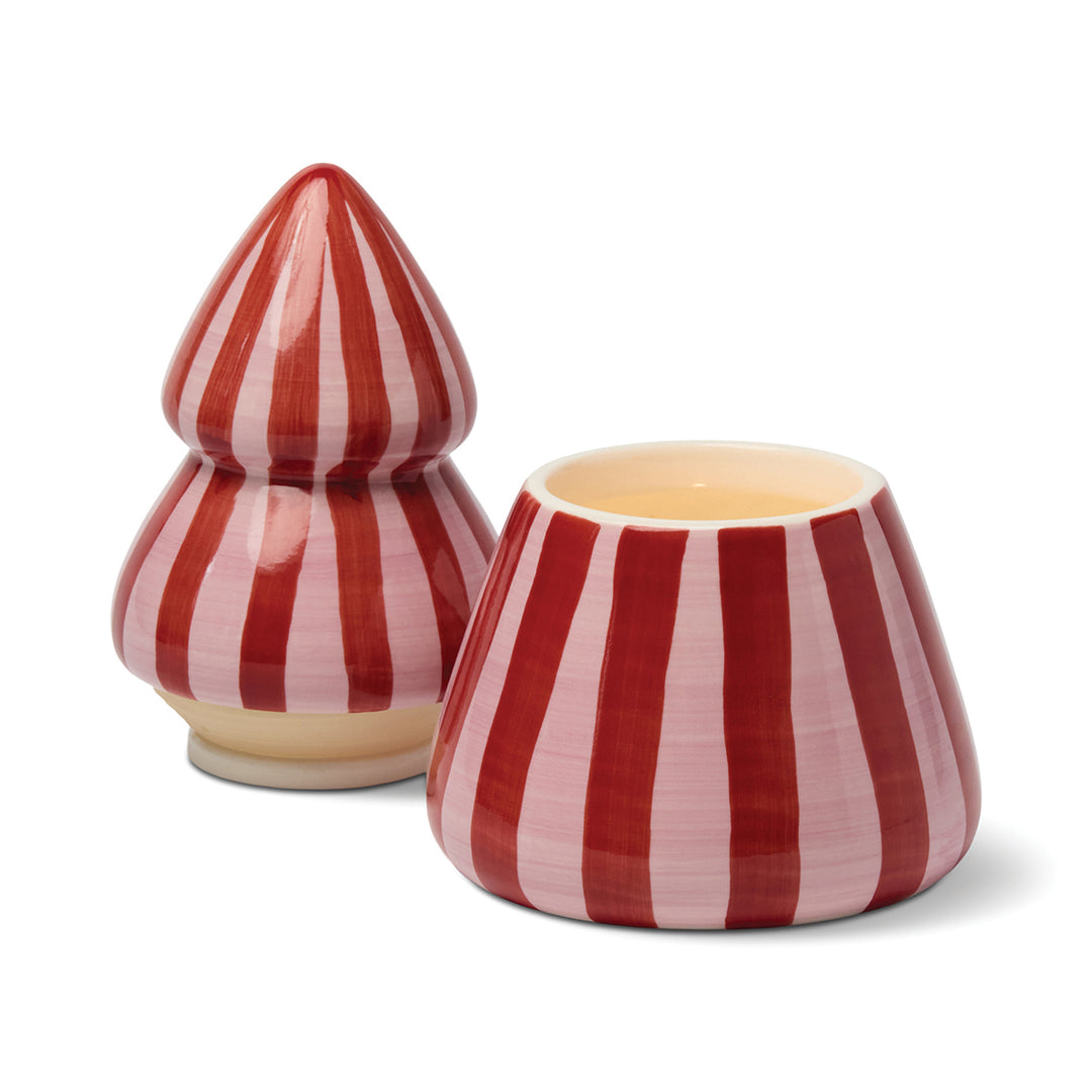 Ceramic Christmas tree shaped candle with red and pink striped design on a white background