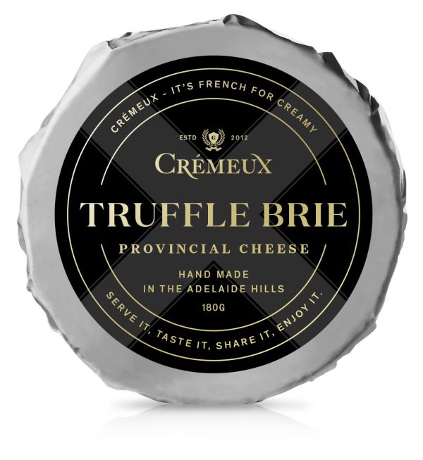 Wheel of Brie cheese on white background