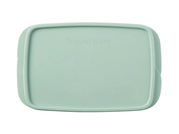 A mint green Tupperware food storage container lid, shown from a top-down view on a plain white background.