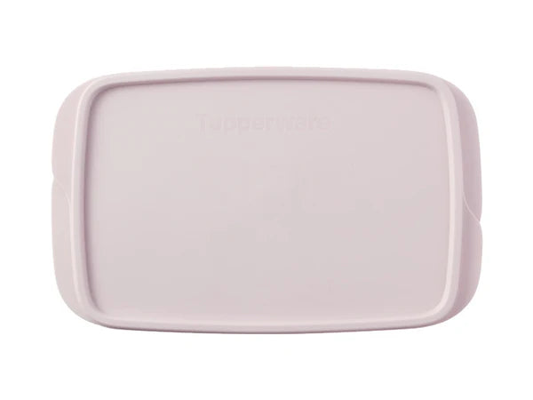 A light pink plastic food storage container lid with rounded corners, featuring the embossed Tupperware logo in the center, shown on a plain white background.