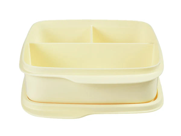 A pale yellow plastic compartment lunch box with a matching lid, shown on a plain white background.