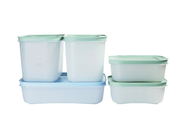 A set of translucent plastic storage containers with light green lids and a light blue base tray, arranged on a plain white background.