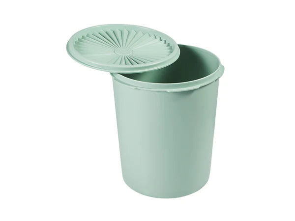 Light green food canister with lid on a white background