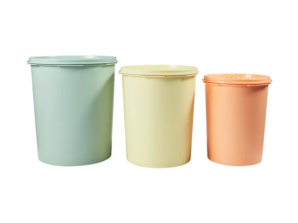 Three pastel-colored food canisters on a white background