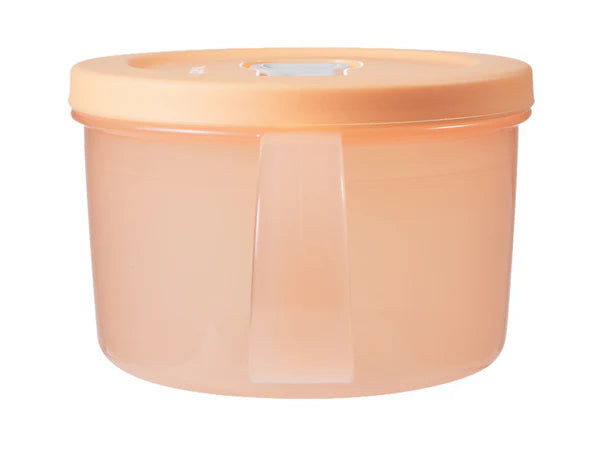 Round plastic container with a peach-colored lid on a white background