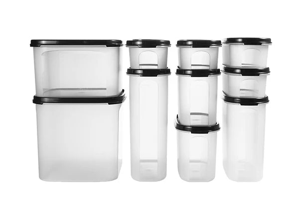 Set of clear plastic containers with black lids on a white background