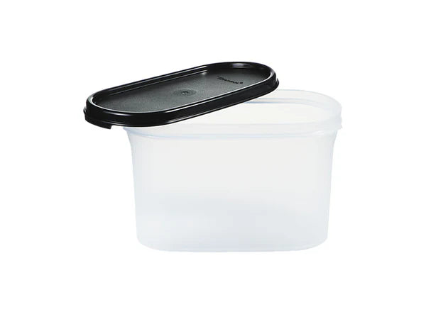 White food storage container with black lid on a white background