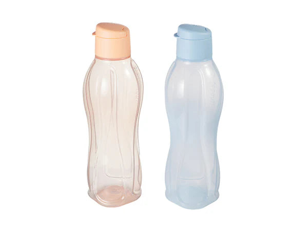 Two translucent plastic bottles with curved shapes, one with a peach-colored cap and the other with a light blue cap, shown on a plain white background.