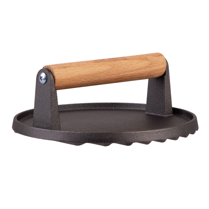Cast iron grill press with wooden handle on a white background