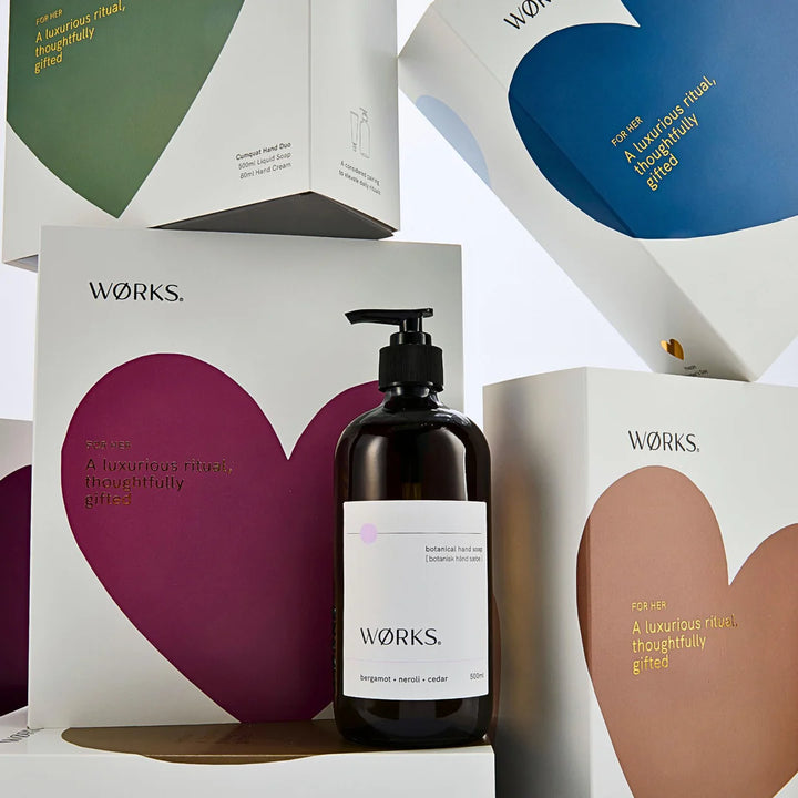 Works skincare bottle with heart-shaped boxes in the background