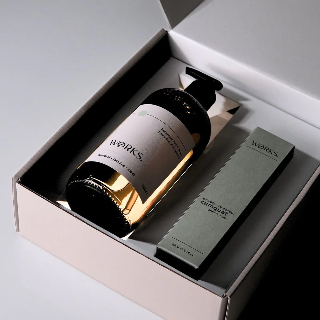 Two bottles with labels inside a box, featuring the brand 'Wärks'.