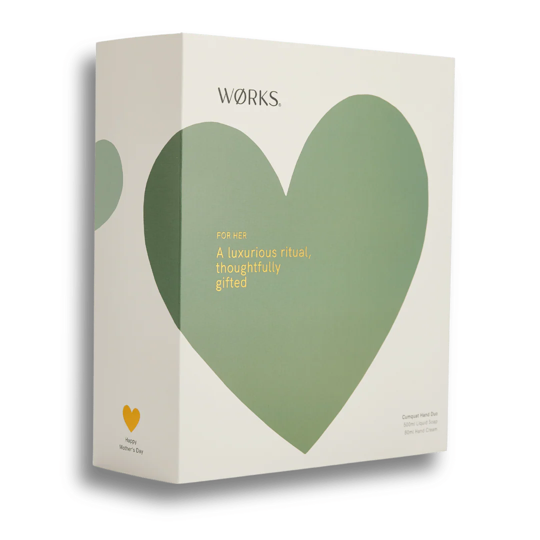 A white gift box with a green heart on a white background