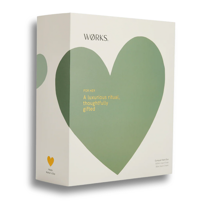 A white gift box with a green heart on a white background