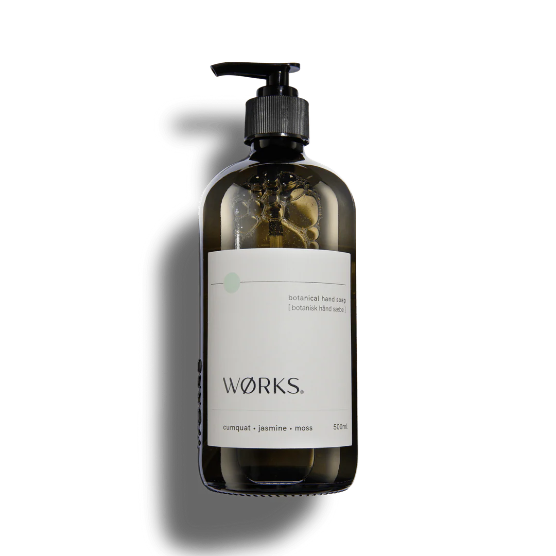 Hand soap bottle with pump and 'Wörks' label on a white background