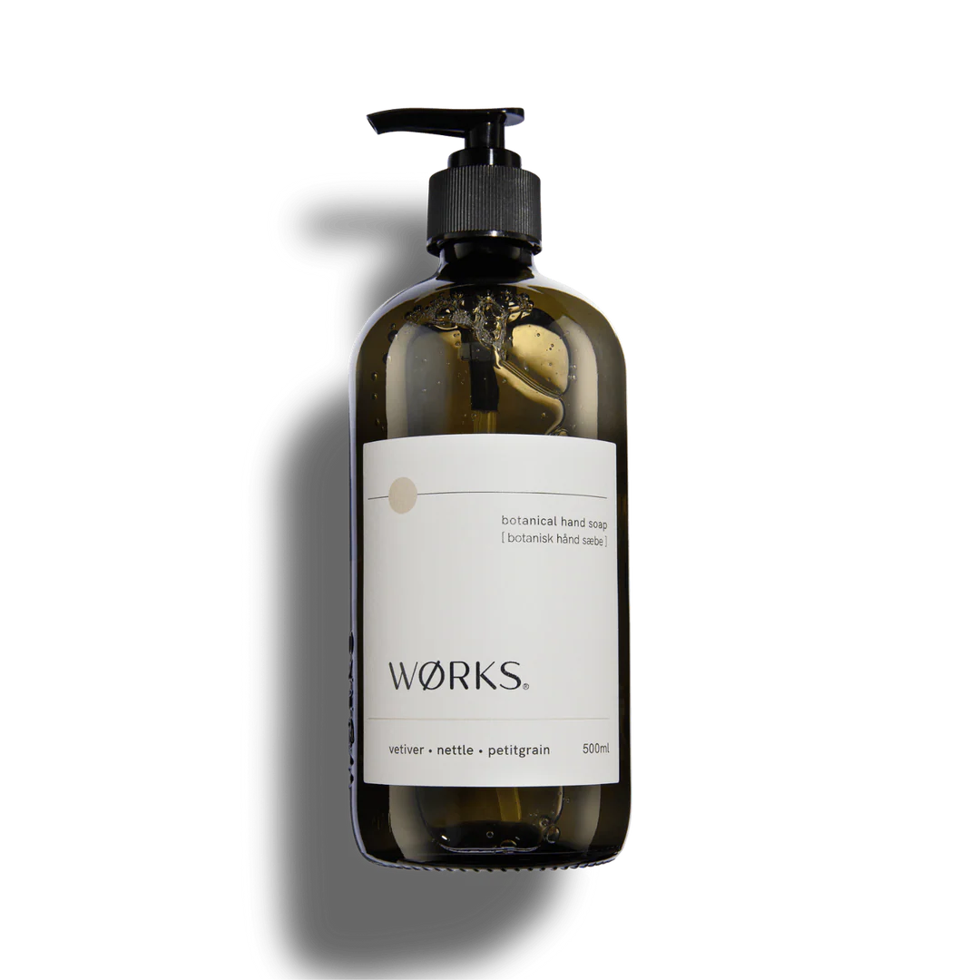 Hand soap bottle with pump and 'Wörks' label on a white background