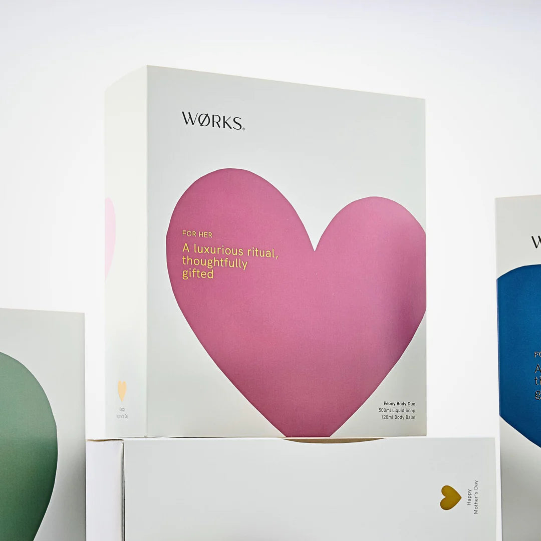 Product packaging with a pink heart design and &