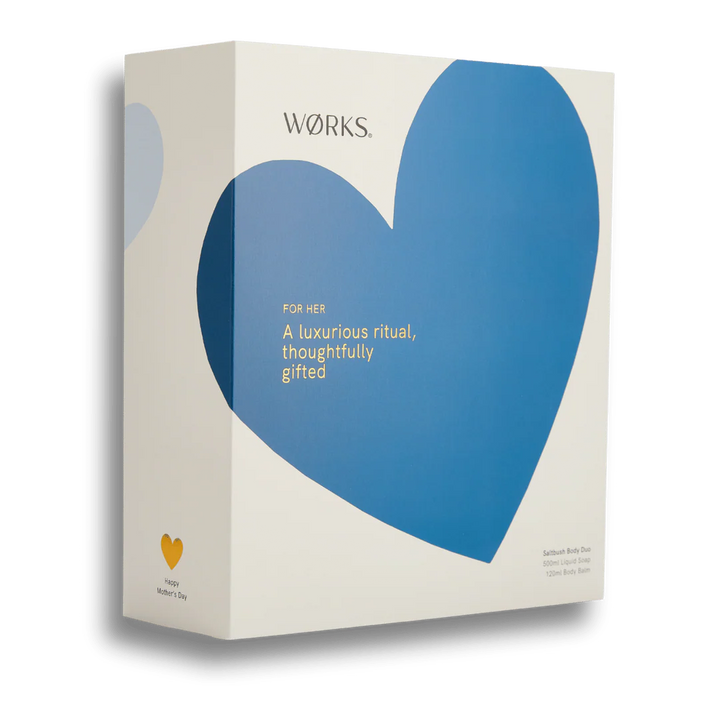 A white gift box with a blue heart on it on a white background