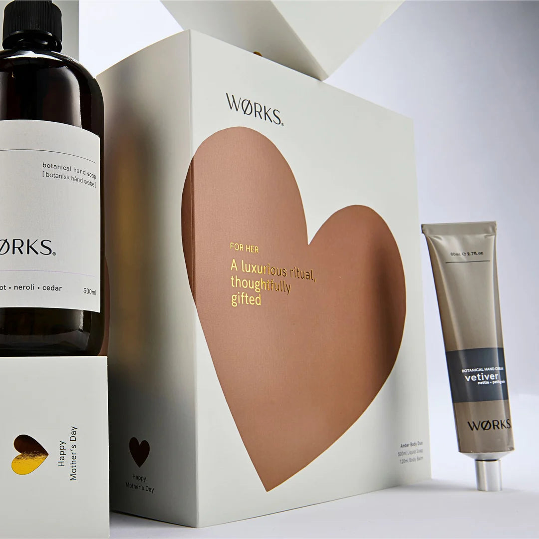 Wörks gift set with heart-shaped box, bottle, and tube on a white background