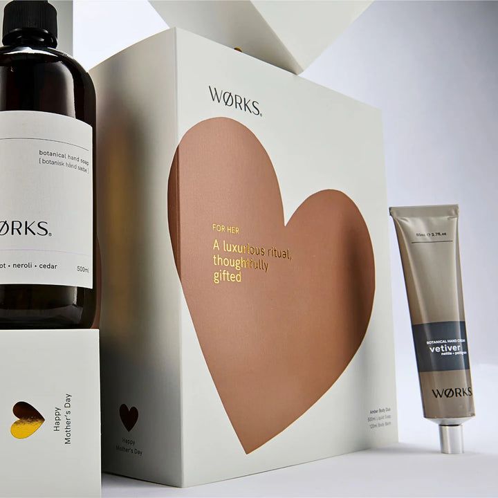 Wörks gift set with heart-shaped box, bottle, and tube on a white background